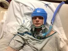 Tori in her traveling safety helmet. When she sees this, she will die. Blue was the color I chose.